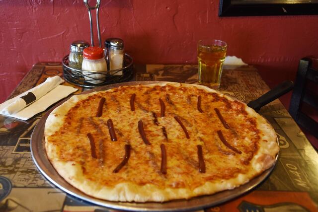 Música, pizza y cervezas: un pareo perfecto