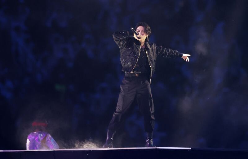 AL KHOR, QATAR - NOVEMBER 20: Jung Kook of BTS performs during the opening ceremony prior to the FIFA World Cup Qatar 2022 Group A match between Qatar and Ecuador at Al Bayt Stadium on November 20, 2022 in Al Khor, Qatar. (Photo by Lars Baron/Getty Images)