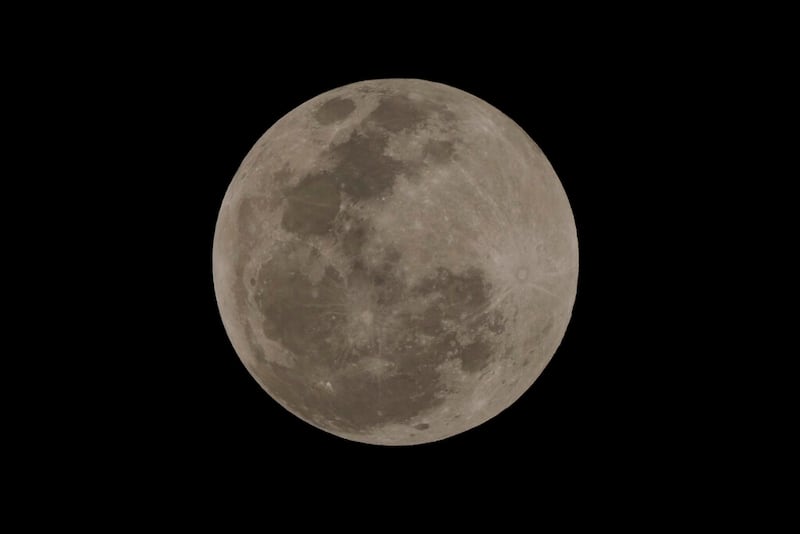 The Moon is seen before the start of a lunar eclipse, in Brasilia, Brazil, Sunday, May 15, 2022. (AP Photo/Eraldo Peres)