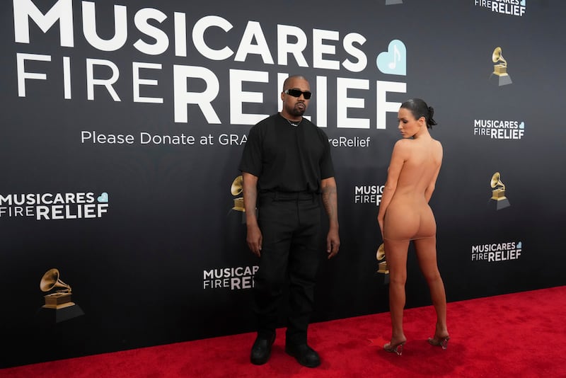 Kanye West, left, and Bianca Censori arrive at the 67th annual Grammy Awards on Sunday, Feb. 2, 2025, in Los Angeles. (Photo by Jordan Strauss/Invision/AP)