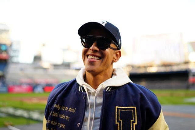 Daddy Yankee estuvo tranquilo compartiendo con Tiger Woods y Celine Dion tras radicación de demanda