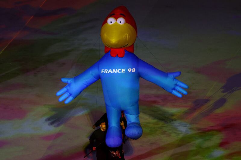 AL KHOR, QATAR - NOVEMBER 20: France World Cup mascot 	Footix is seen during the opening ceremony prior to the FIFA World Cup Qatar 2022 Group A match between Qatar and Ecuador at Al Bayt Stadium on November 20, 2022 in Al Khor, Qatar. (Photo by Elsa/Getty Images)