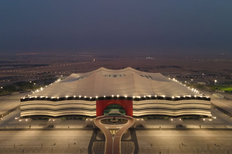 AL KHOR, QATAR - JUNE 19: (EDITORS NOTE: This photograph was taken using a drone) An aerial view of Al Bayt at sunrise on June 19, 2022 in Al Khor, Qatar. Al Bayt stadium will host the opening game of the FIFA World Cup Qatar 2022 starting in November. The stadium, designed by the studio Dar Al-Handasah, takes its name from bayt al sha'ar – tents historically used by nomadic people in Qatar and the Gulf region. (Photo by David Ramos/Getty Images)