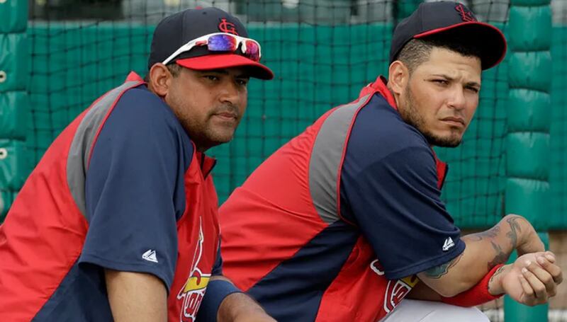 Los hermanos Bengie y Yadier Molina.