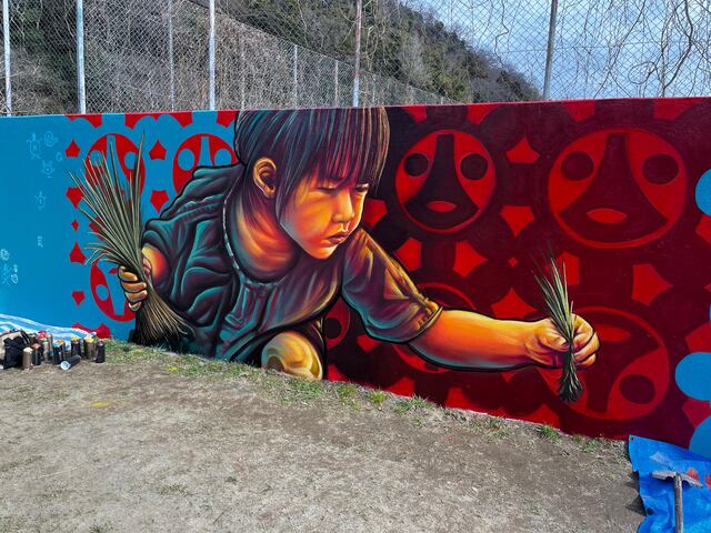 El sol taíno boricua brilla en Japón con mural del artista Rafique