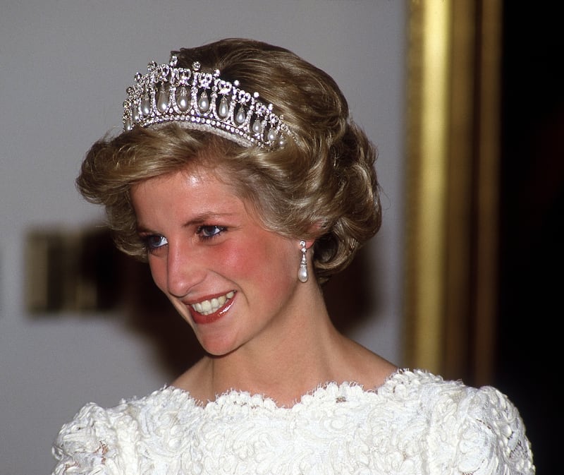Princess Diana (1961 - 1997) at a dinner at the British Embassy, Washington D.C., November 1985. She is wearing a cream lace Murray Arbeid gown and the Queen Mary tiara. (Photo by Terry Fincher/Princess Diana Archive/Getty Images)   