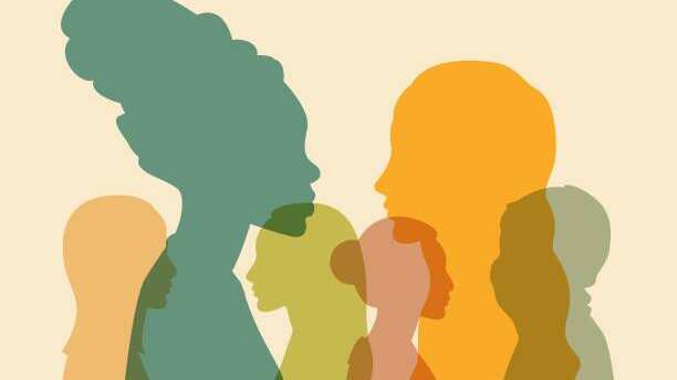 Silhouettes of women from different cultures. Multicultural society. The concept of racial equality and anti-racism. Communication and friendship of women of different nationalities.