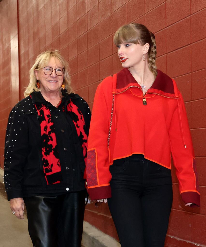 KANSAS CITY, MISSOURI - NOVEMBER 29:  Singer Taylor Swift walks into the stadium alongside Donna Kelce prior to the game between the Las Vegas Raiders and the Kansas City Chiefs at GEHA Field at Arrowhead Stadium on November 29, 2024 in Kansas City, Missouri. (Photo by Jamie Squire/Getty Images)