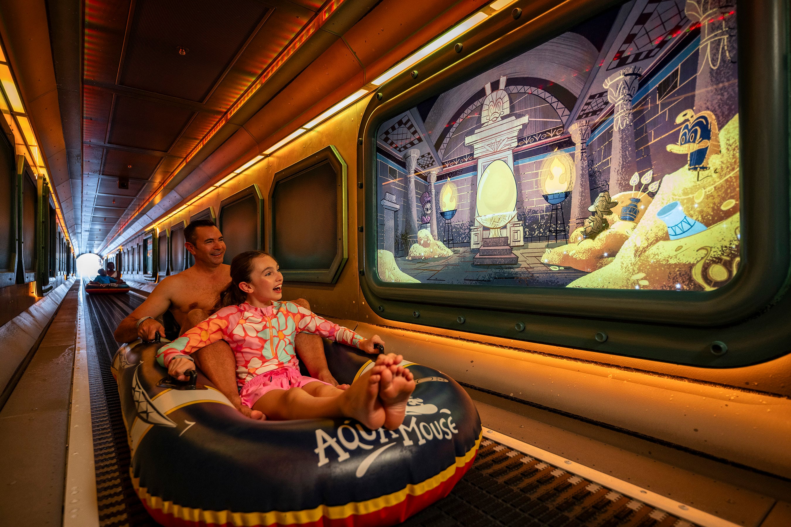 Aboard the Disney Treasure, AquaMouse, Disney Cruise Line’s own attraction at sea, introduces an all-new storyline to its existing lineup that follows Mickey Mouse and Minnie Mouse on a zany misadventure into an ancient temple. Suspended high above the upper decks, powerful jets propel two-person ride vehicles through 760 feet of winding tubes, offering breathtaking views of the ocean and the ship below.