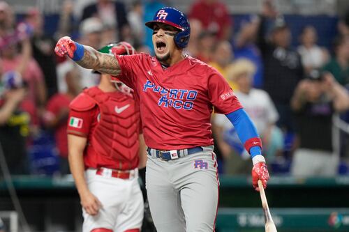 ¡Dos jonrones! Puerto Rico pica al frente en la primera entrada con cuadrangulares de Báez y Rosario