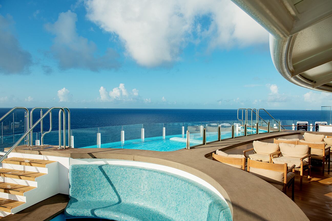 Adults can indulge in sun-drenched serenity at Quiet Cove, a peaceful refuge dedicated to lounging, sipping and soaking. Set away from the bustle of family activities, this secluded adults-only district features a luxurious infinity pool and poolside bar. (Disney)