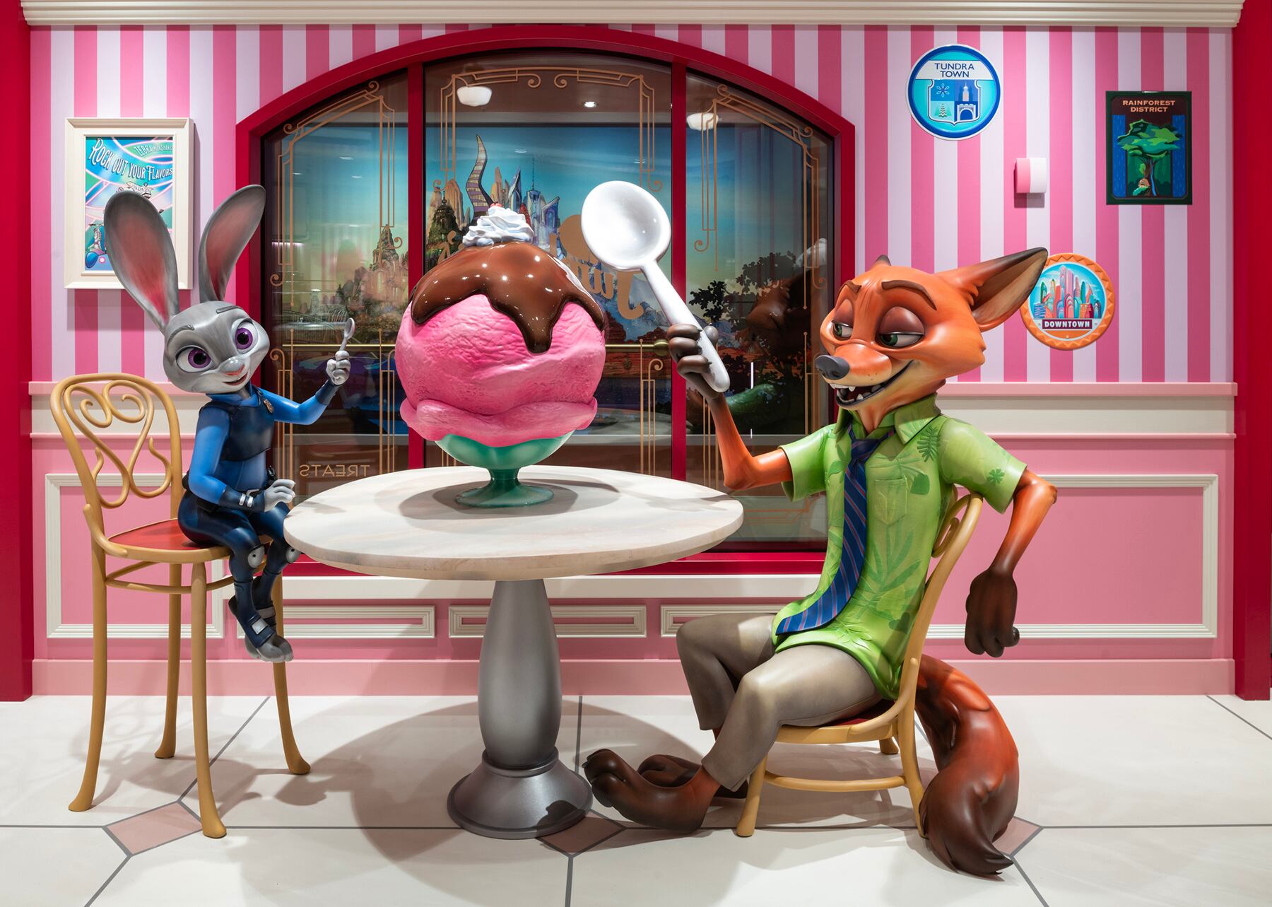 Aboard the Disney Treasure, Disney Cruise Line’s newest ship, Jumbeaux’s Sweets, is reminiscent of the popular ice cream parlor, Jumbeaux Café, from the bustling mammal metropolis featured in Disney’s “Zootopia.” Surrounded by playful pink interiors, Victorian-style architecture and an endearing sculpture of Officer Judy Hopps and Nick Wilde, guests are served humor and heart by the cone full, along with a selection of more than 20 flavors of handmade gelato, 16 flavors of ice cream and sorbets, specialty treats, candies and more. (Kent Phillips, photographer)