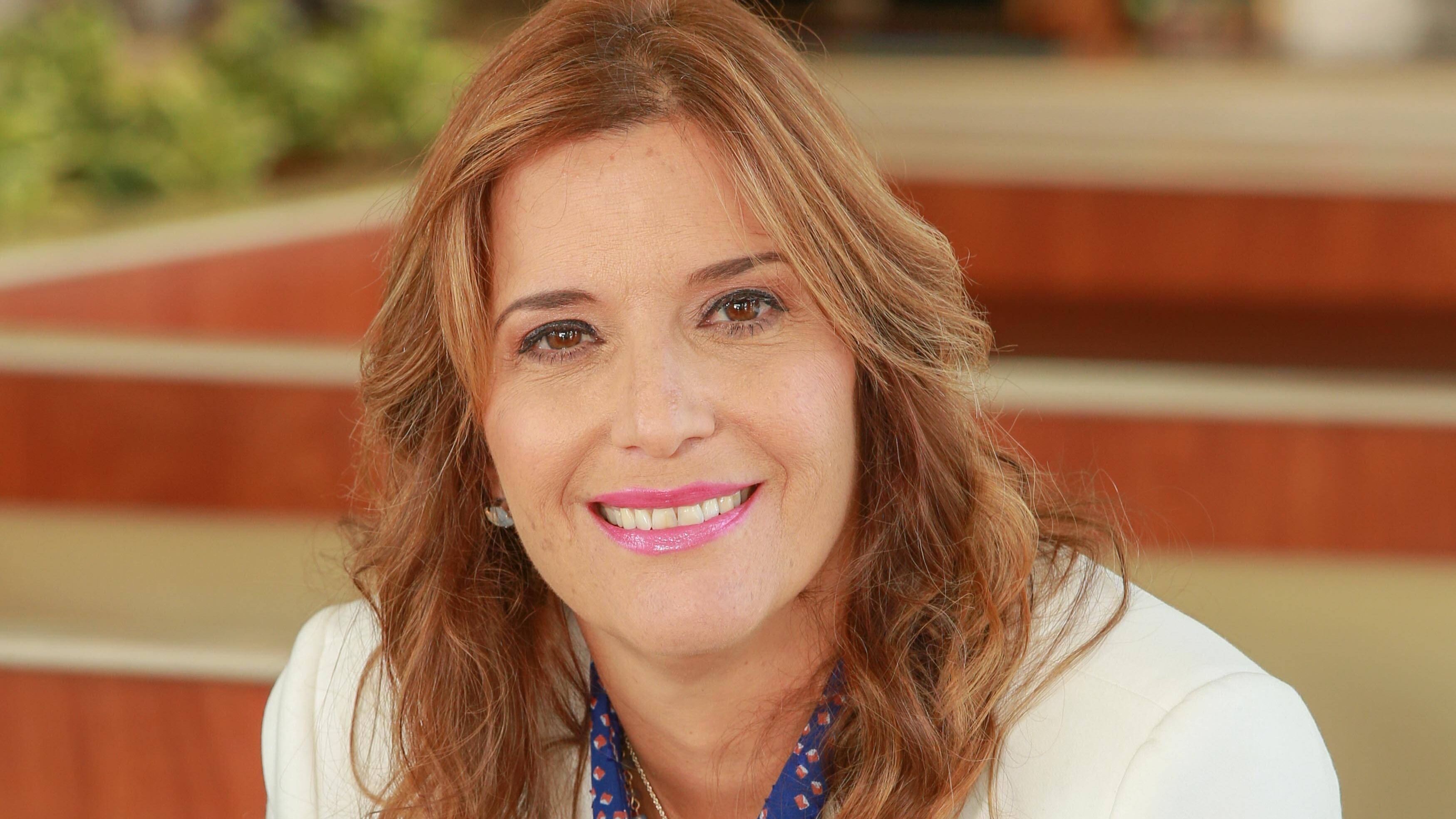 Marisol Vega Couto, Managing Director de Arcos Dorados Puerto Rico & USVI, sonríe a la cámara.