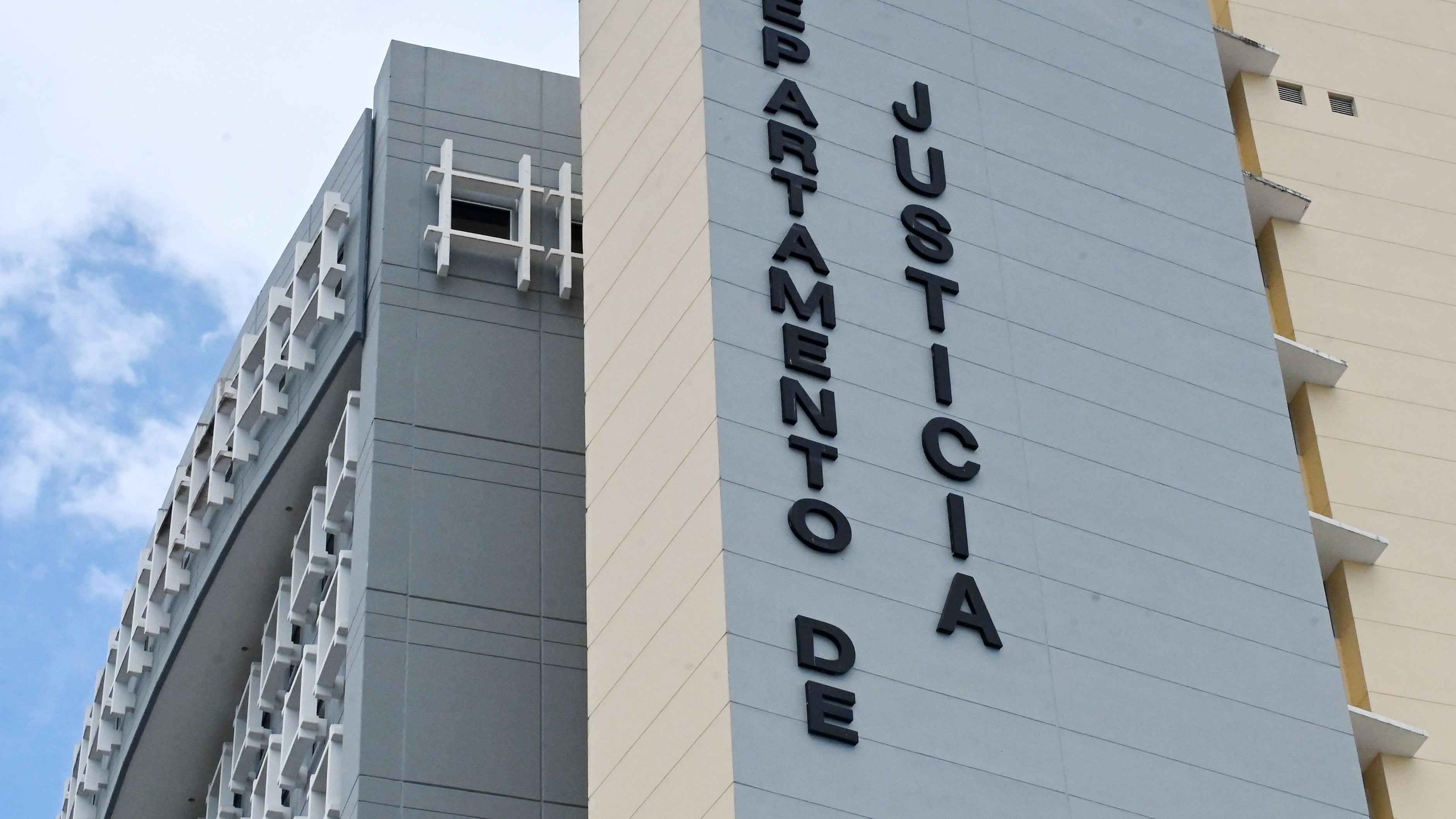 Departamento de Justicia.
