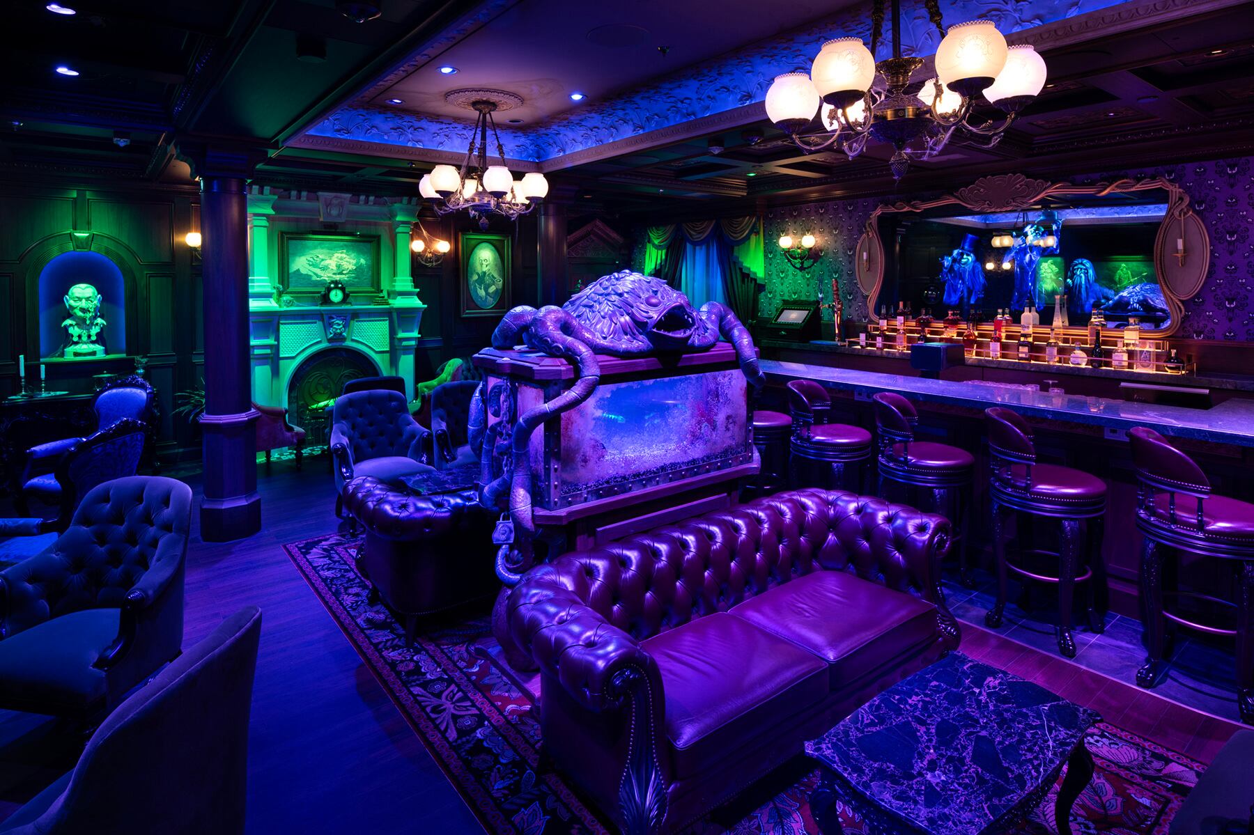 Aboard the Disney Treasure, the Haunted Mansion Parlor honors more than five decades of fandom and introduces the world to the next chapter of the Haunted Mansion saga. Guests will enjoy spooktacular, specialty cocktails themed to the classic Disney Parks attraction and its inhabitants, as well as a variety of Haunted Mansion details from around the world. (Kent Phillips, photographer)